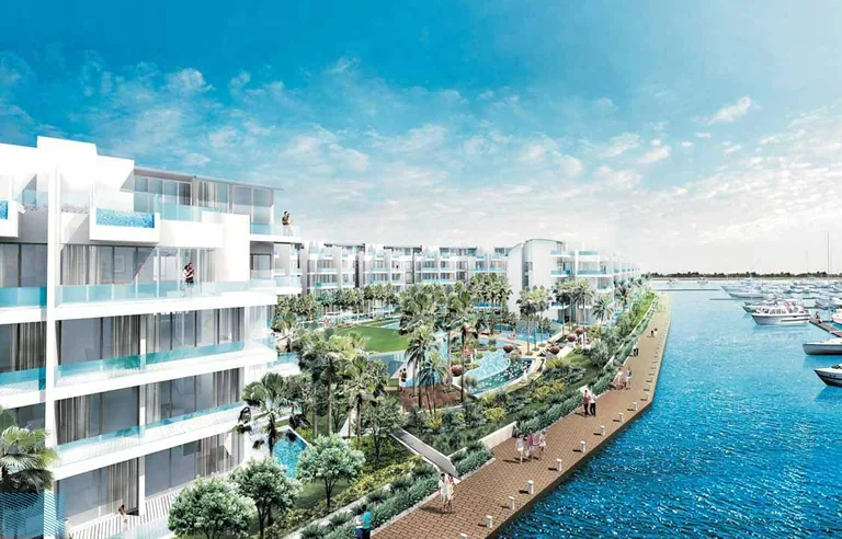 Marina Collection, artist’s impression: the white terraced blocks with glass balconies above the pools and gardens, and the waterfront promenade running beside the berths of the marina